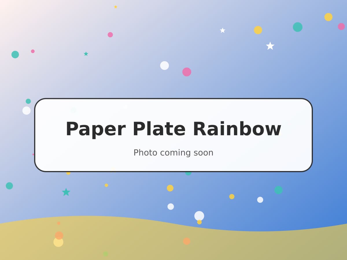 A paper plate rainbow with bright tissue paper stripes and cotton wool clouds